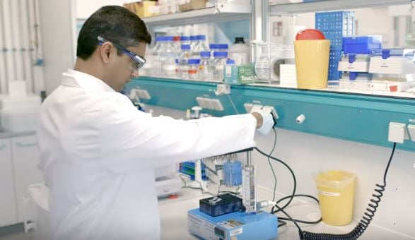 Researcher at the European Molecular Biology Lab using Organomation's MICROVAP sample evaporator