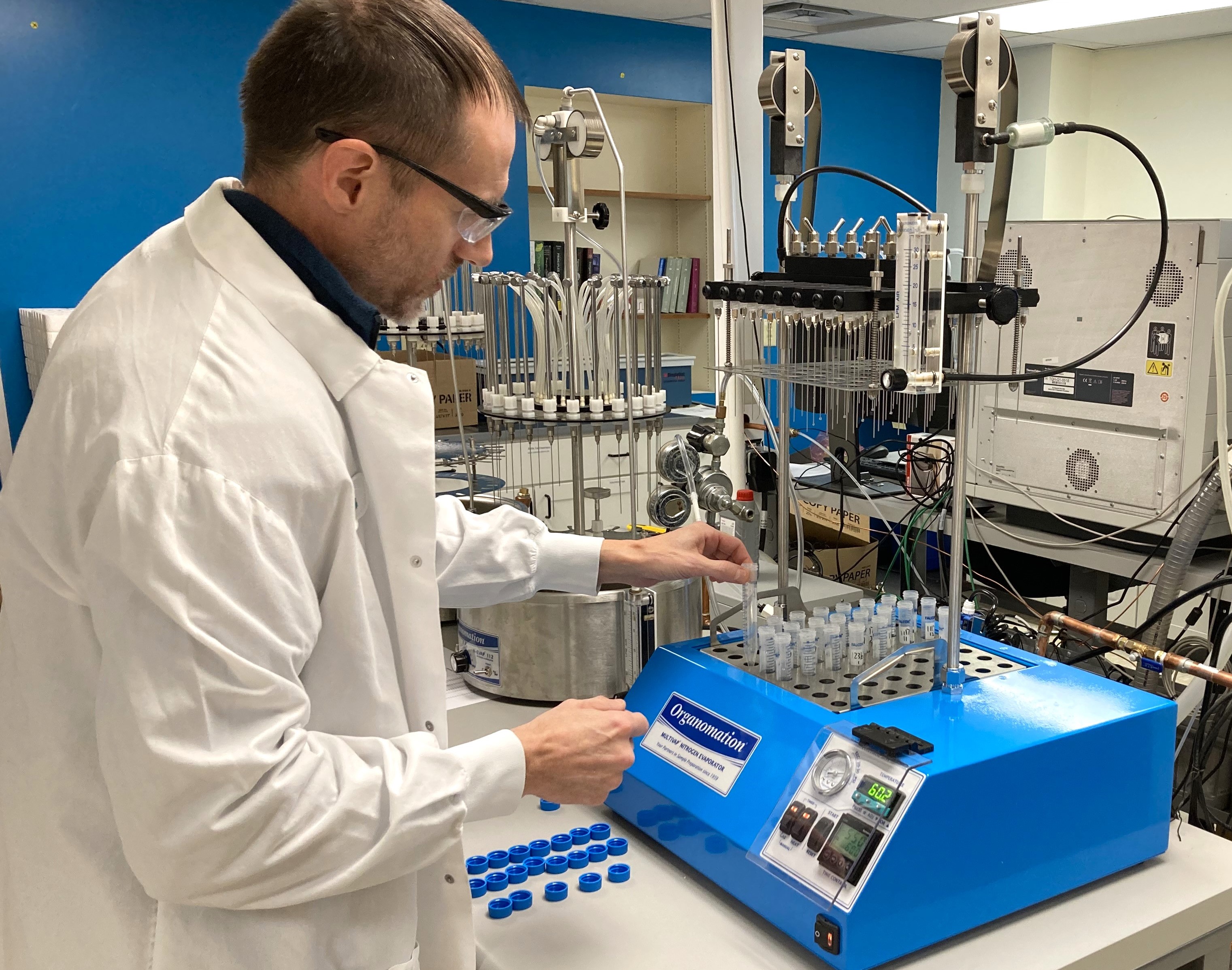 Microbac's LCMS Analyst, John Richards, loading samples into the MULTIVAP