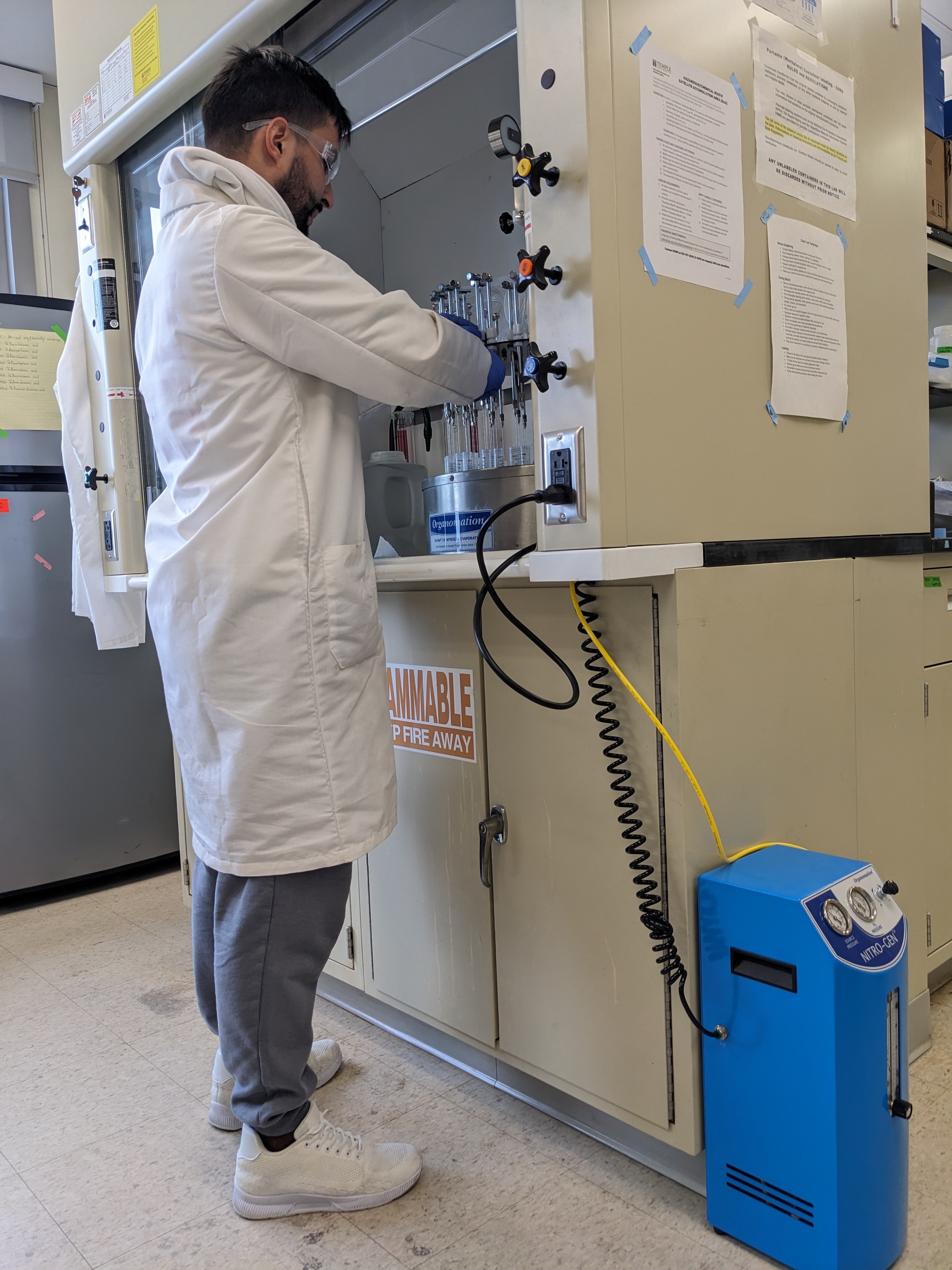 Lab tech from Temple University using an Organomation nitrogen evaporator hooked up to Organomation's NITRO-GEN nitrogen generator