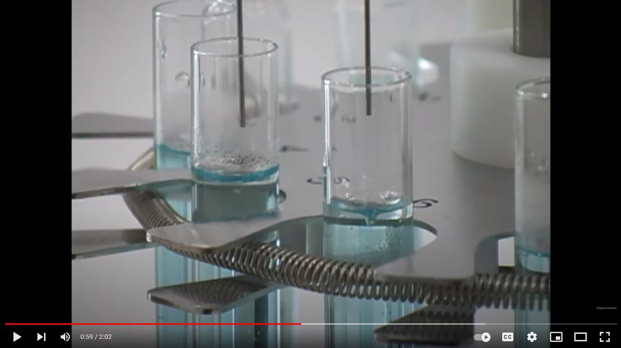 Test tubes being evaporated in sample holder of Organomation's N-EVAP nitrogen evaporator